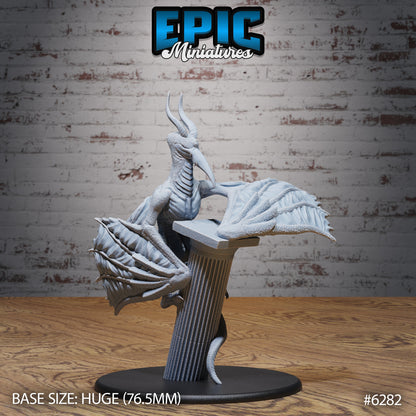 Cyclops wyvern monster miniature perched on broken stone column wings extended single eye horned dragon Dungeons and Dragons resin miniature huge base