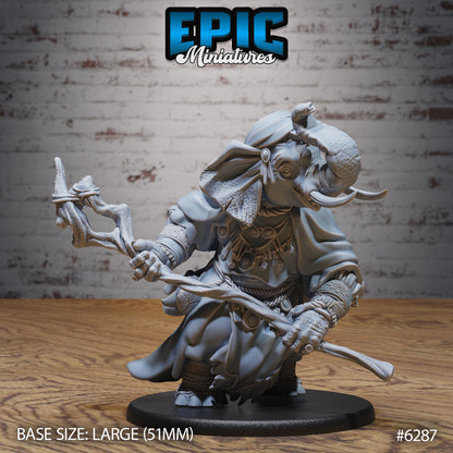 Loxodon druid miniature combat pose gripping twisted staff tusks forward robed elephant humanoid Dungeons and Dragons resin tabletop miniature large base