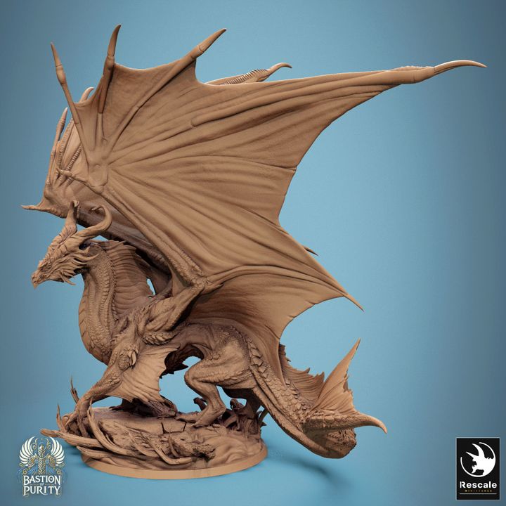 Side view of the bronze dragon miniature, showing the large wings and detailed texture of the dragon's body and tail