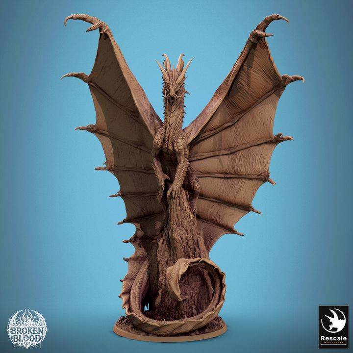 Front view of the Legendary Metallic Gold Dragon miniature with outstretched wings and detailed scales, perched on a rocky base.