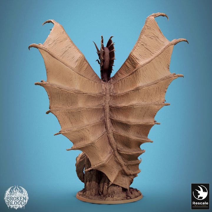 Back view of the Legendary Metallic Gold Dragon miniature, displaying the massive, textured wings folded in a regal posture.