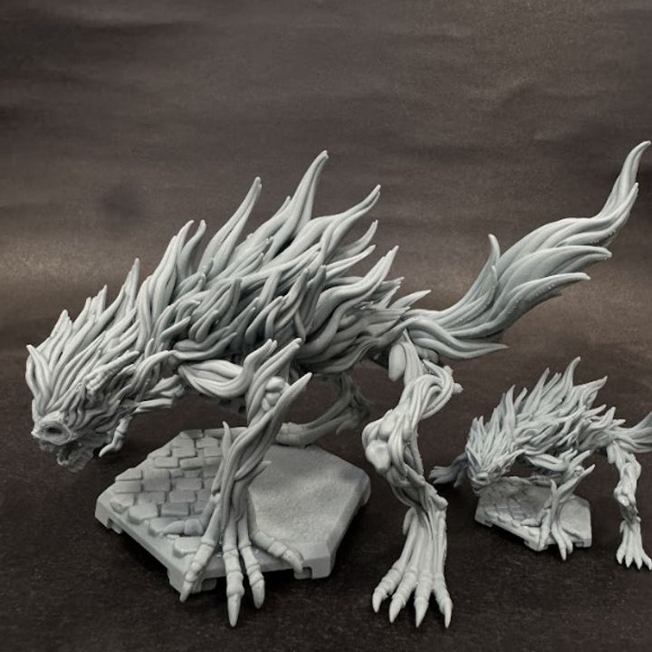 The Deadbeast miniature shown in two different scales with detailed skeletal and spiked features.