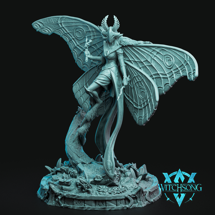 The Moth Queen full miniature with grand moth wings, staff, and flowing robes standing on a rune-carved base surrounded by forest flora.