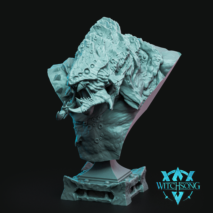 Bust of Seastrider Behemoth showing a snarling, barnacle-encrusted sea monster head with jagged teeth and fin-like growths, set on a stone pedestal.