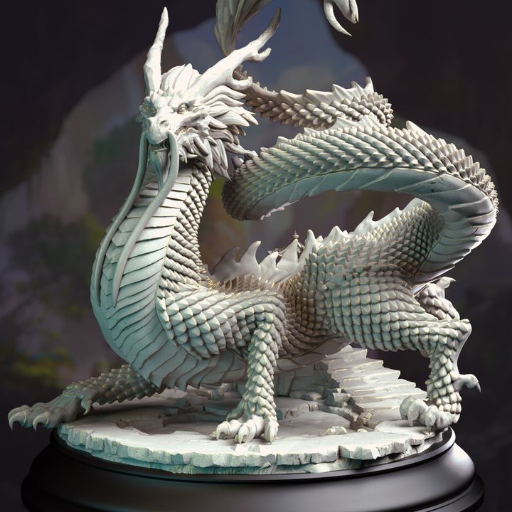 Shinkoryu miniature depicting a coiled, serpentine dragon with intricate scales, flowing whiskers, and a fierce expression, standing majestically on a rocky base.