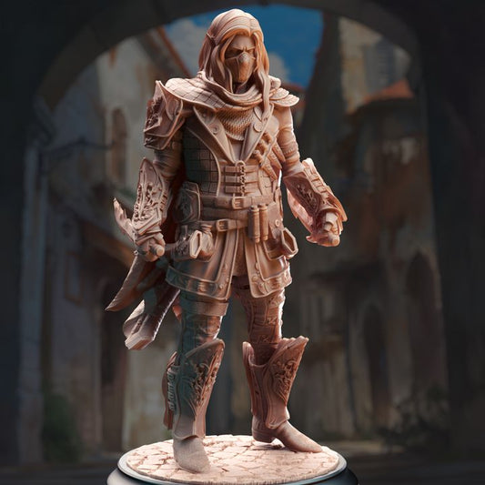 Sylvios the Slip, Elf Rogue Thief miniature in a dynamic stance, wearing a hooded cloak, intricate armor, and a mysterious mask. Perfect for adding a rogue character to your TTRPG adventures like Dungeons & Dragons.