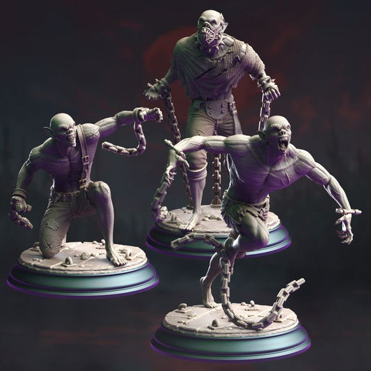 Group of three Vampire Thrall miniatures in various poses, each bound by chains, ideal for fantasy TTRPGs.