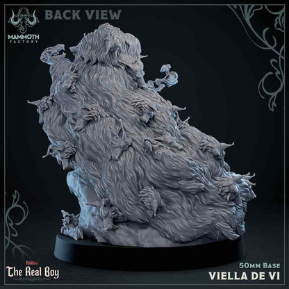 Rear view of Viella De Vi miniature, showing the intricate details of the hound-filled pelt enveloping the figure.