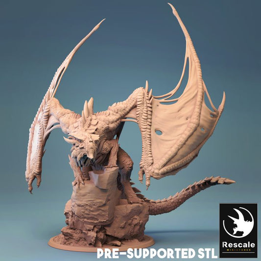 Highly detailed Adult Magma Dragon miniature posed on a rocky outcrop, with outstretched wings and a menacing expression, ideal for tabletop RPGs and fantasy displays.