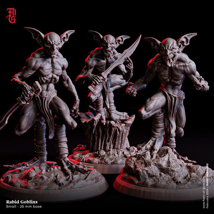 Three rabid goblins in dynamic poses, one perched on a stump and others standing, all armed and ready for battle.