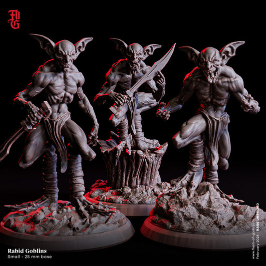 Three rabid goblins in dynamic poses, one perched on a stump and others standing, all armed and ready for battle.