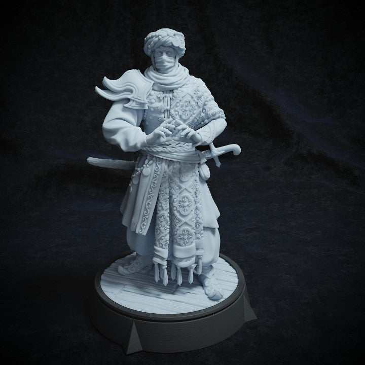 Jordan Jonrar figurine standing poised, wearing elaborately embroidered robes, sword sheathed.