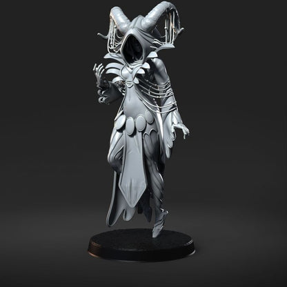 The Trickster, a hooded figure with large twisted horns, adorned with flowing robes and mysterious decorations, depicted in a detailed miniature for dark fantasy tabletop RPGs.