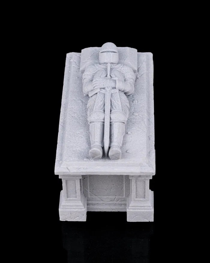 Ancient stone sarcophagus terrain with armored knight effigy carved into the lid, rectangular tomb base, and worn ruin detailing for fantasy dungeon and crypt encounters