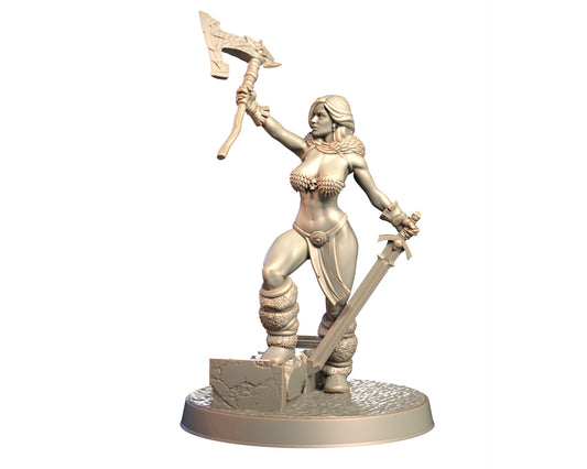 Brakka female human barbarian miniature holding axe aloft and sword at her side, standing on stone base.
