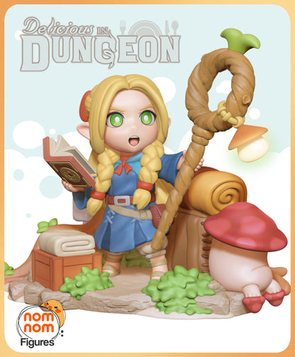 Chibi Marcille figurine holding a staff and spellbook, standing alongside a mushroom creature in a whimsical diorama.