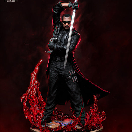 Blade collectible figure rear angle showing long trench coat and dynamic base with blood effects.
