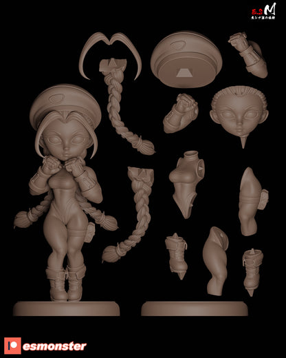 Modular part breakdown of Chibi Cammy figure showing separated braids, head, limbs, torso, and accessories laid out for assembly.
