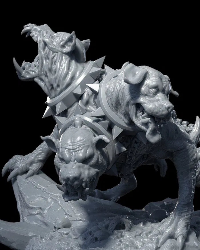 Close- up view of Cerberus, the three-headed monster, with one snarling head and another growling, showing its detailed spiked collars and powerful stance.