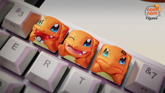 Charmander keycap set with three expressions on mechanical keyboard