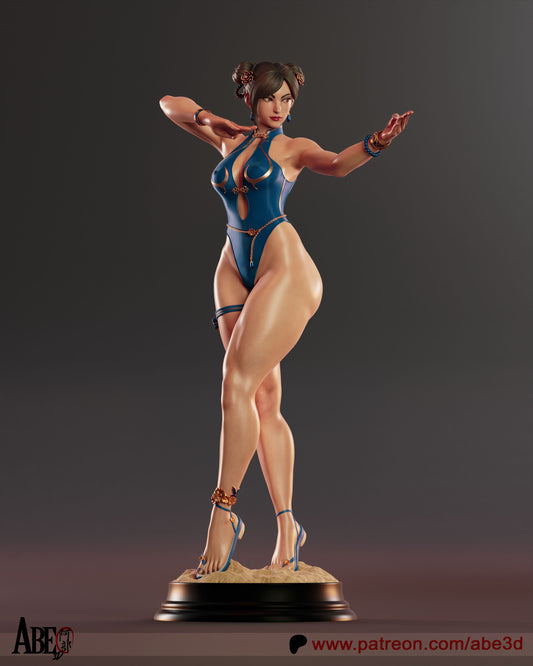 Full-body view of Chun-Li 1:4 scale collectible figure from Street Fighter, standing in a martial arts pose on a rocky base, wearing blue heels and ornate accessories.