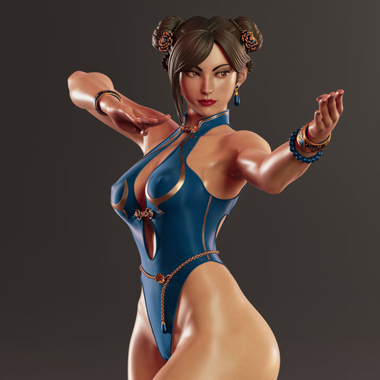 Front view of Chun-Li 1:4 scale collectible figure from Street Fighter, posed in a fighting stance wearing a blue qipao-style bodysuit with gold accents and jewelry.
