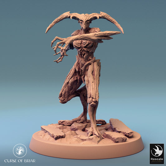 A charging wood fey with outstretched claws, dynamic pose with cracked stone detailing the base.