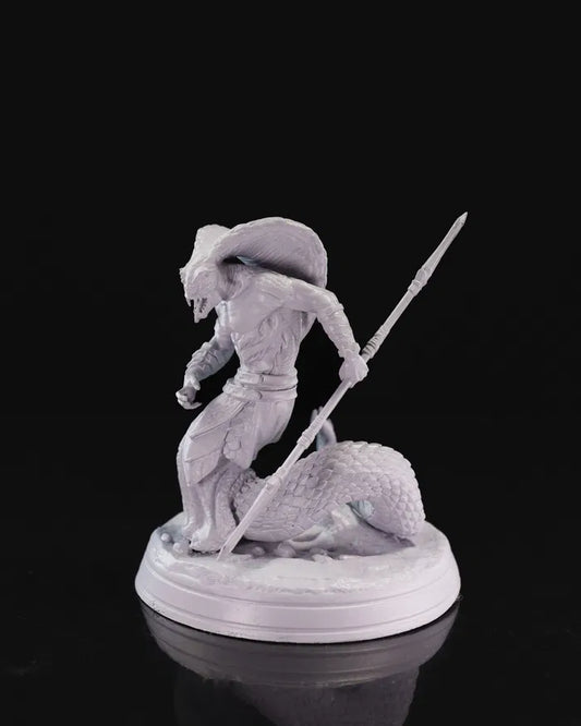 Krutzi yuan-ti miniature poised with a spear, featuring a coiled serpent tail and a serious expression.