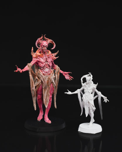 75mm Painted and 32mm unpainted Vecna-inspired miniatures side by side, showing the intricate details of the torn flesh, twisted horns, and skeletal structure.