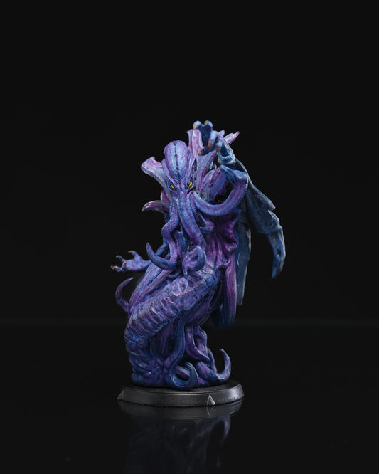 Painted mind flayer miniature in purple and blue tones, standing with raised tentacles and glowing yellow eyes, ready to cast a spell.