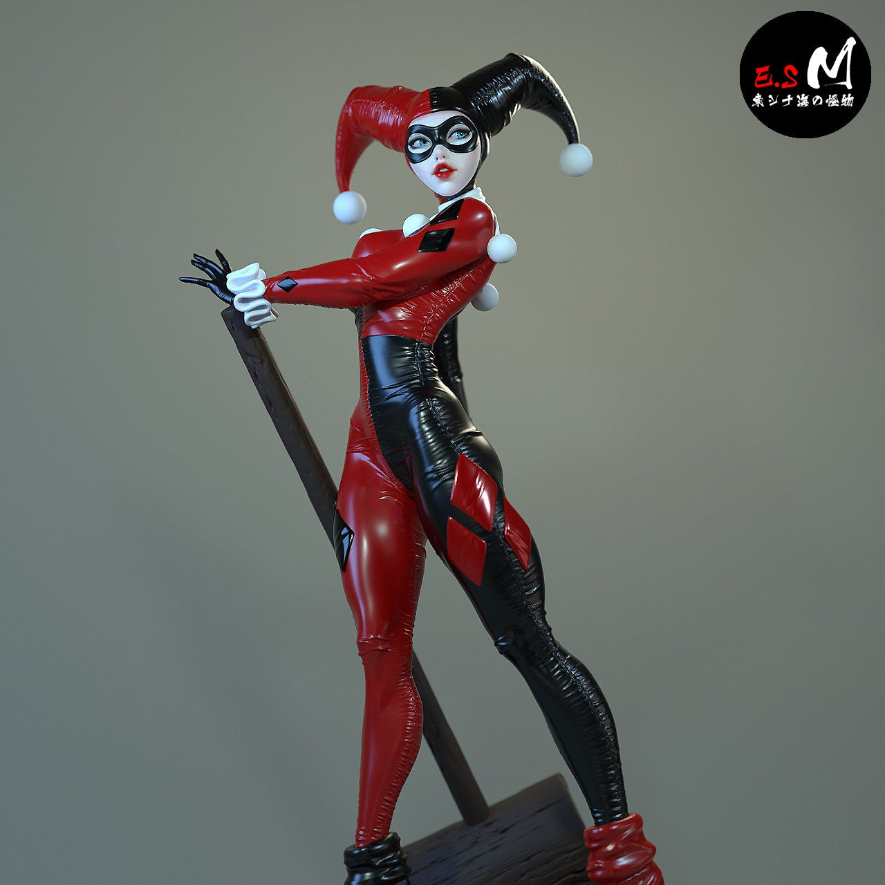 Fully painted Harley Quinn figure in red and black jester suit, gripping a large mallet with playful yet menacing expression.