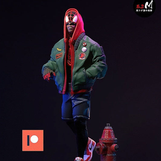 Miles Morales Spider-Man 1:6 scale figure standing on urban base with fire hydrant, wearing hooded jacket, mask, shorts, sneakers, collectible statue