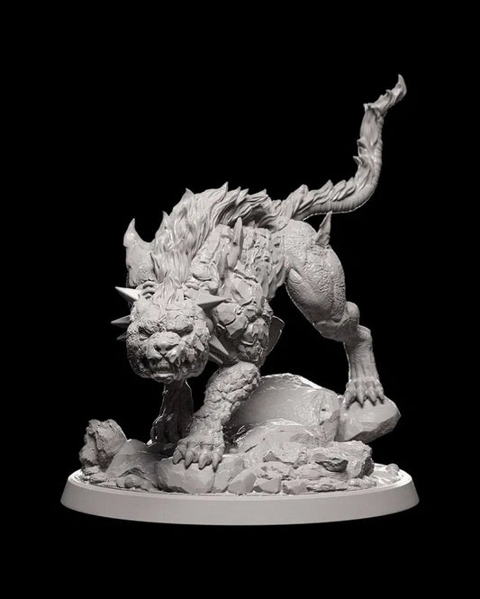 Fire Giant Hellhound miniature, fur like a blazing fire, in a prowling stance over rocky terrain, with its tail raised and flames licking its form.