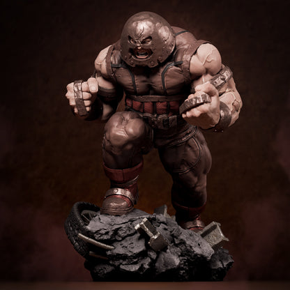Front angle of painted Juggernaut collectible figure mid-charge, breaking through debris with aggressive pose and detailed sculpting.