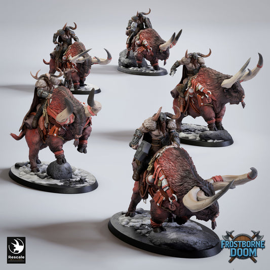 Group of Vargir Frosthorn miniatures, mounted warriors on giant horned beasts over snow terrain.