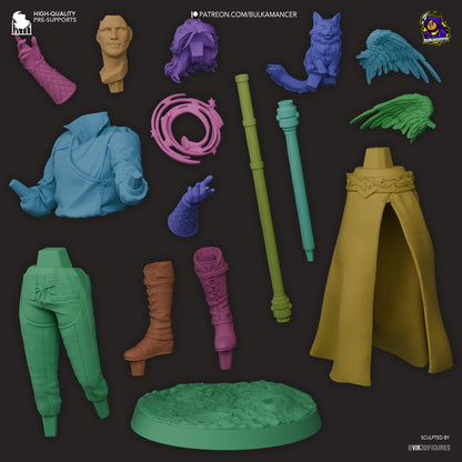 Exploded view of the Gale and Tara collectible showing modular parts including staff, base, arms, heads, hair, boots, torso, and Tara with removable wings.