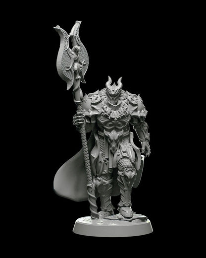 A miniature figure of Garkan, the Champion, a heavily armored warrior standing tall with a massive double-bladed staff in his right hand. He is wearing ornate full plate armor adorned with detailed engravings and a flowing cape, projecting a formidable presence.