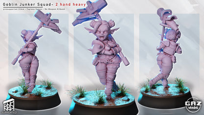 female goblin junker miniature lifting two handed heavy weapon overhead, aggressive goblin brute pose for sci fi battles