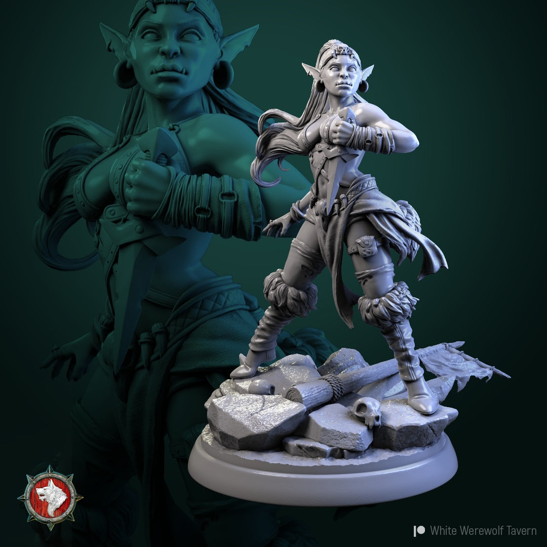 Goblin Thief miniature rear view – female goblin rogue with long hair braid, detailed clothing, and dagger on base with skulls, suitable for tabletop RPGs.