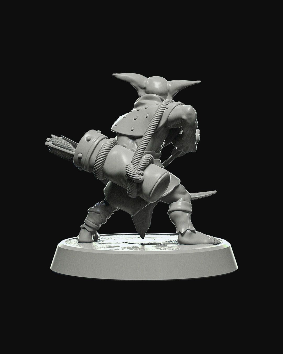 Back view of the Goblin Archer miniature showing its leather armor, quiver of arrows, and crossbow.