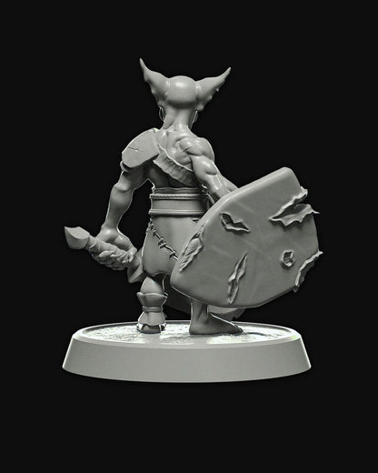 Back view of Goblin Fighter miniature, showcasing the detailed shield and rugged leather armor, ideal for 3D printing and painting in fantasy RPG settings.