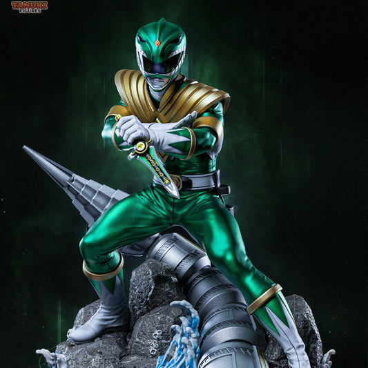 Green Ranger Power Rangers 1:6 scale figure front view in combat pose holding Dragon Dagger, emerald armor, gold chest shield, rocky diorama base with water splash effects and drill-like mechanical element.