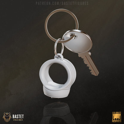 Lantern ring keychain accessory designed to resemble the Star Sapphire Corps emblem, attached to a metal ring with a key.