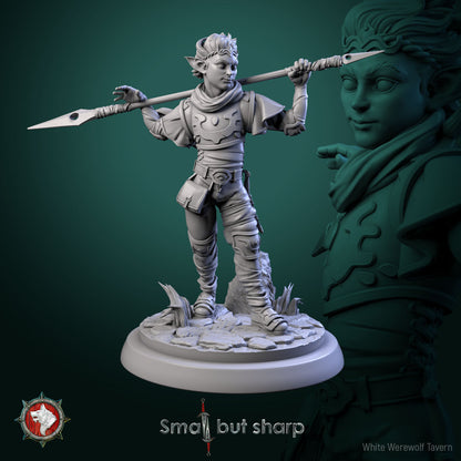 Halfling warrior miniature holding spear in defensive stance, male fighter.