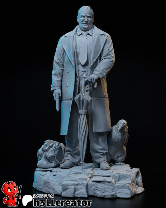 Front clay render of Oswald “Oz” Cobb standing confidently in trench coat, holding umbrella and gun, with penguin companion and duffel on cracked urban base.