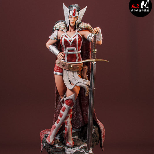 Painted Lady Sif 1:6 scale collectible figure posed with sword and Asgardian armor on a rocky base, front view.