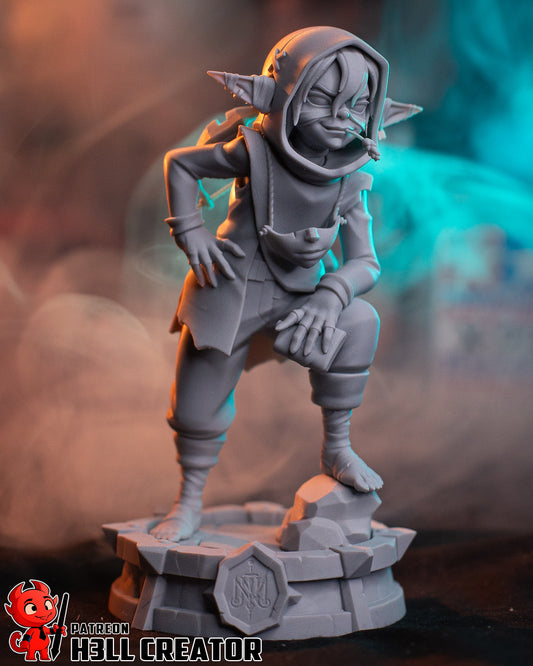 Revvetha Veth Brenatto goblin rogue 1:8 scale figure front view in crouching pose with hood, mask pouch, and rocky display base