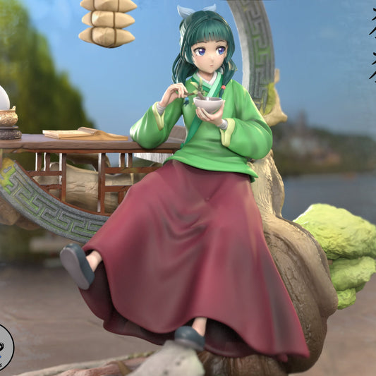 Maomao 1:8 scale painted figurine version with green top, red skirt, and serene expression holding bowl.
