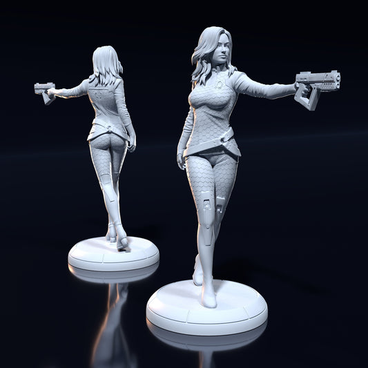 Front and back view of unpainted Miranda figure in full bodysuit holding a pistol on a round base.

