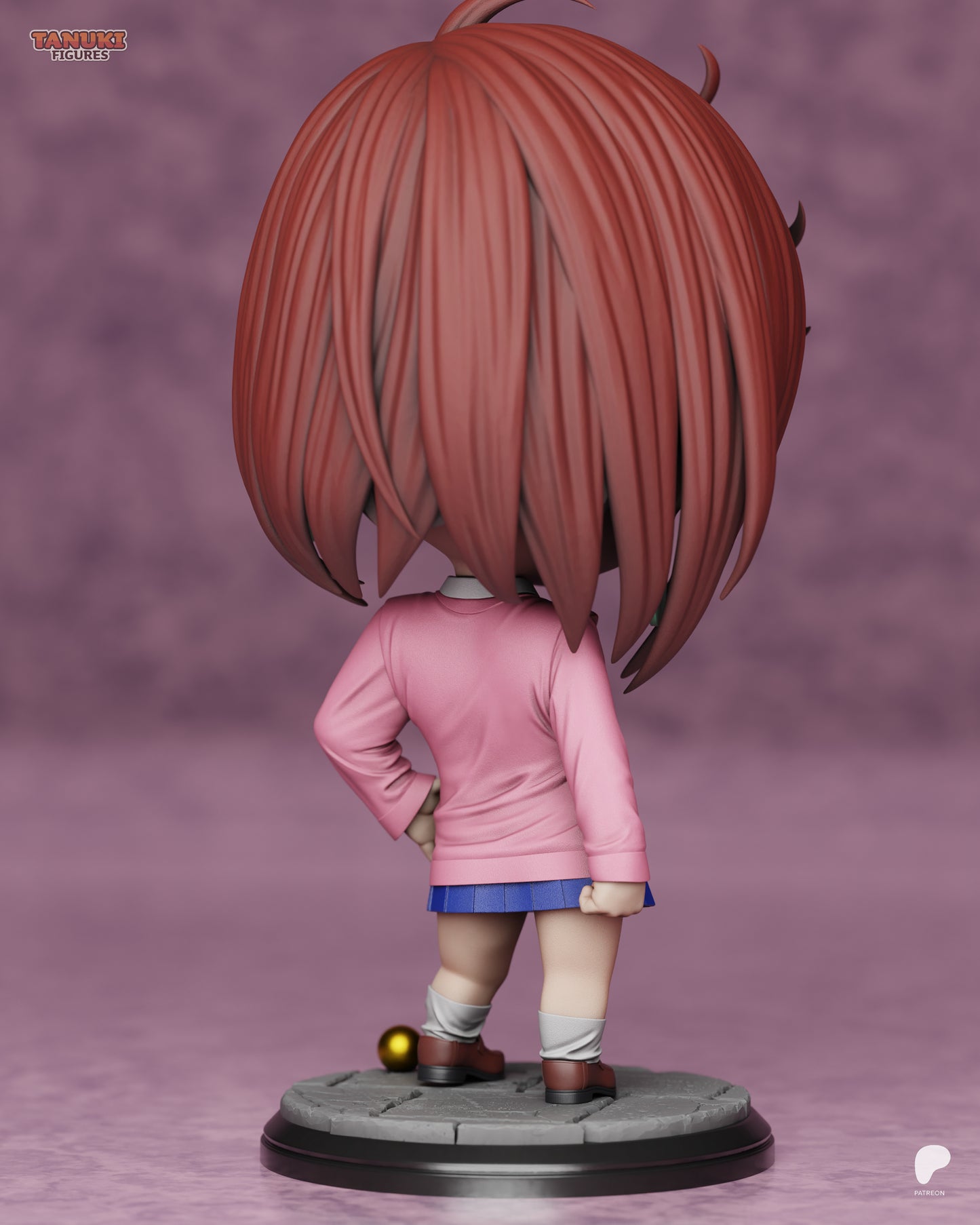 Rear view of chibi Momo Ayase showing long layered hair, pink sweater, and small base with gold ball detail.